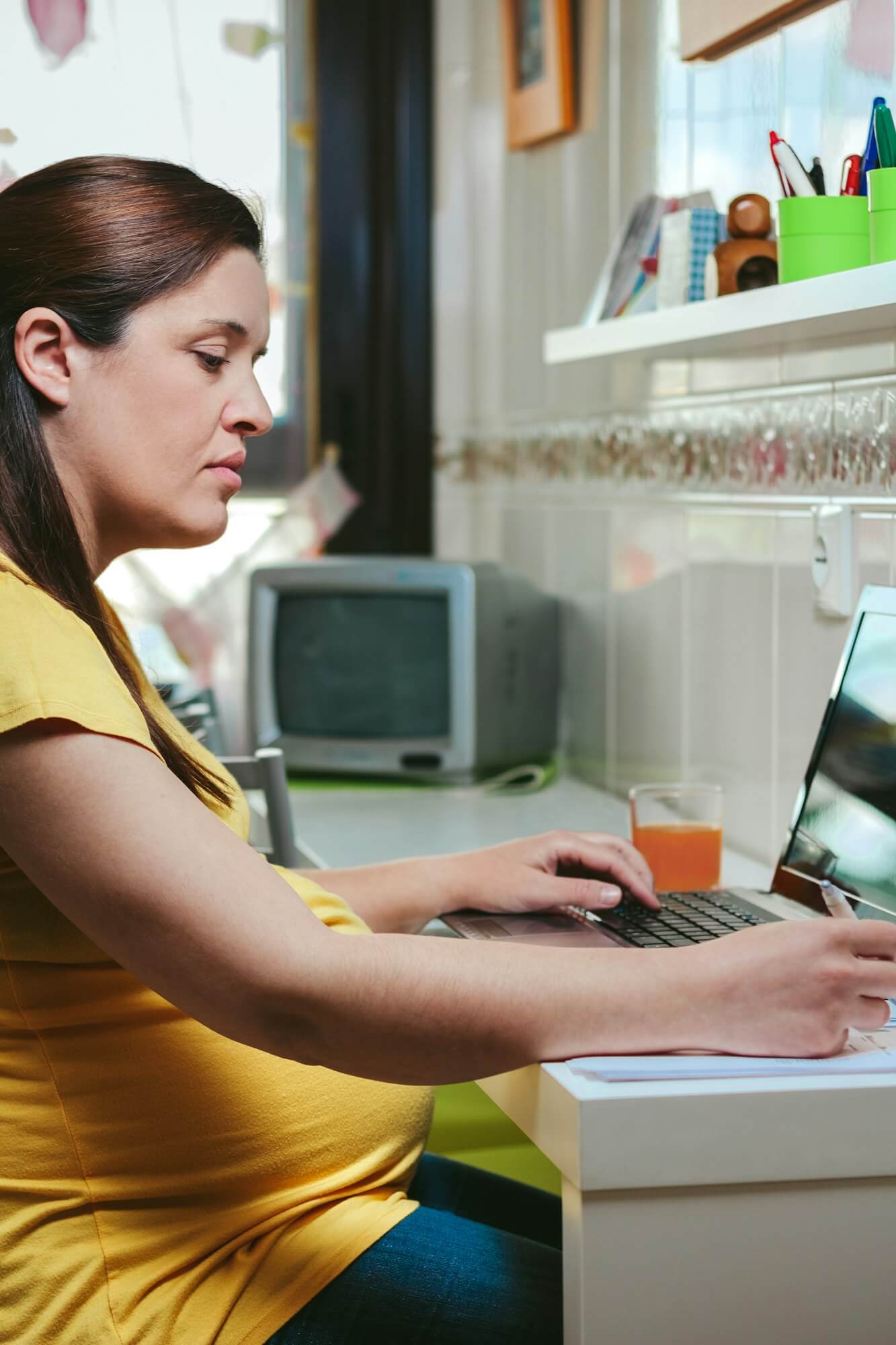 Woman working from home with laptop